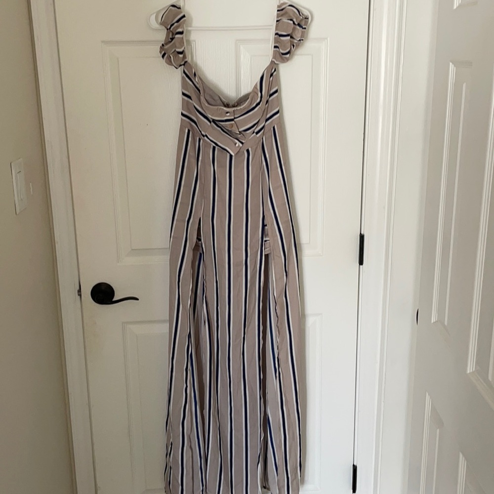 Beautiful dress. Off the shoulder. Lined. Romper style maxi dress.